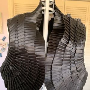 You will love this silk vest it goes perfect with everything